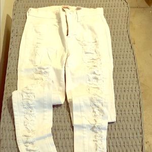 White High waisted distressed skinny jeans